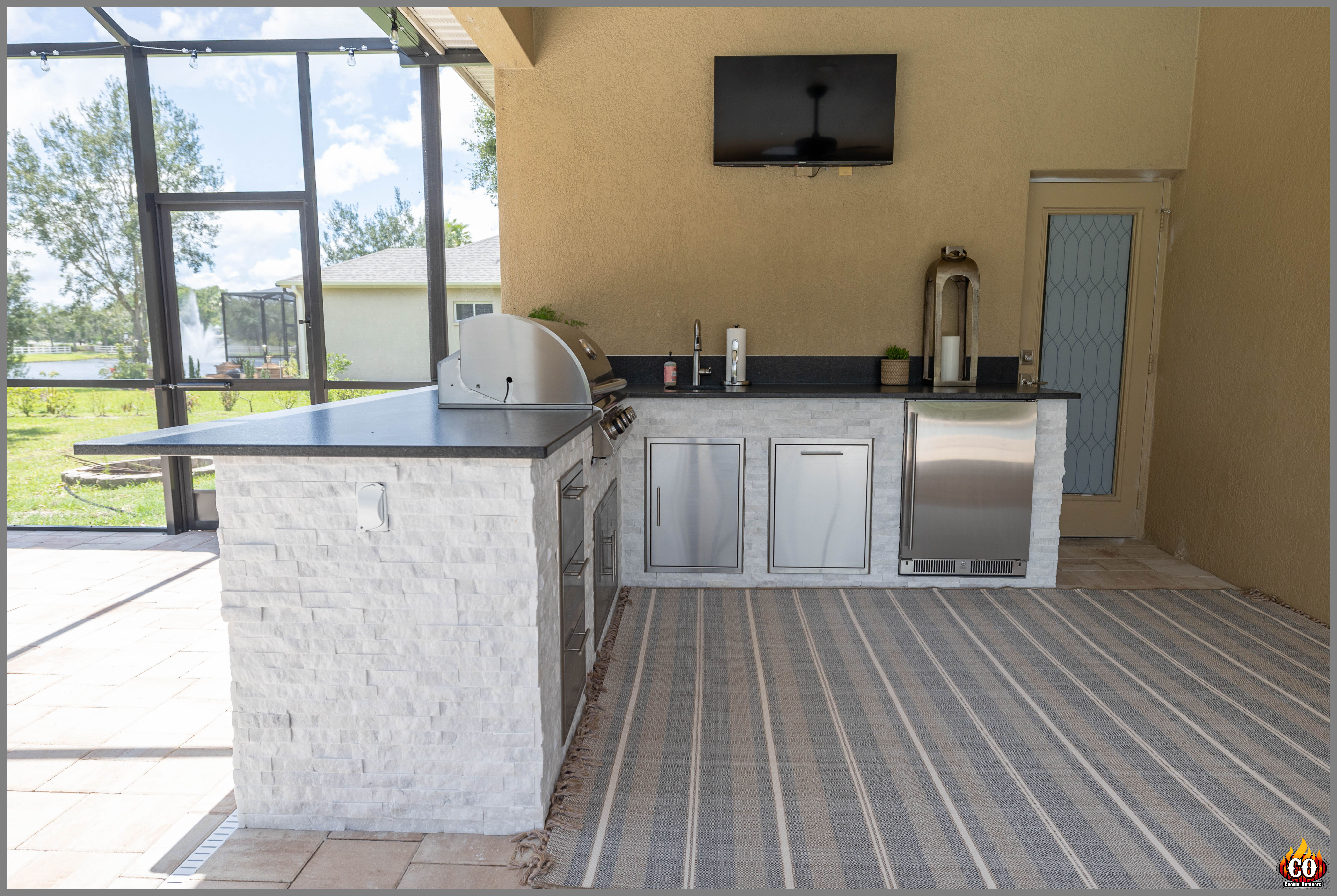 Outdoor kitchen with grill